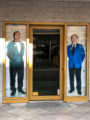 Stanley Diamond restaurant entrance with men in suits